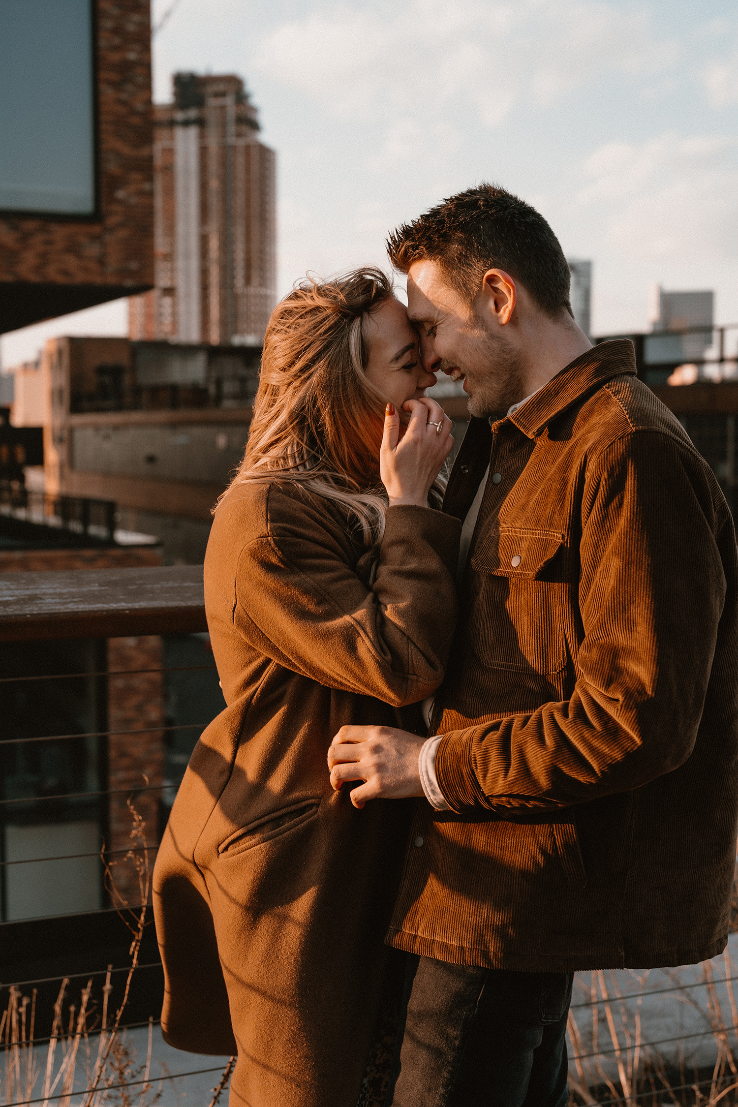Rooftop photos during a Williamsburg engagement photoshoot.