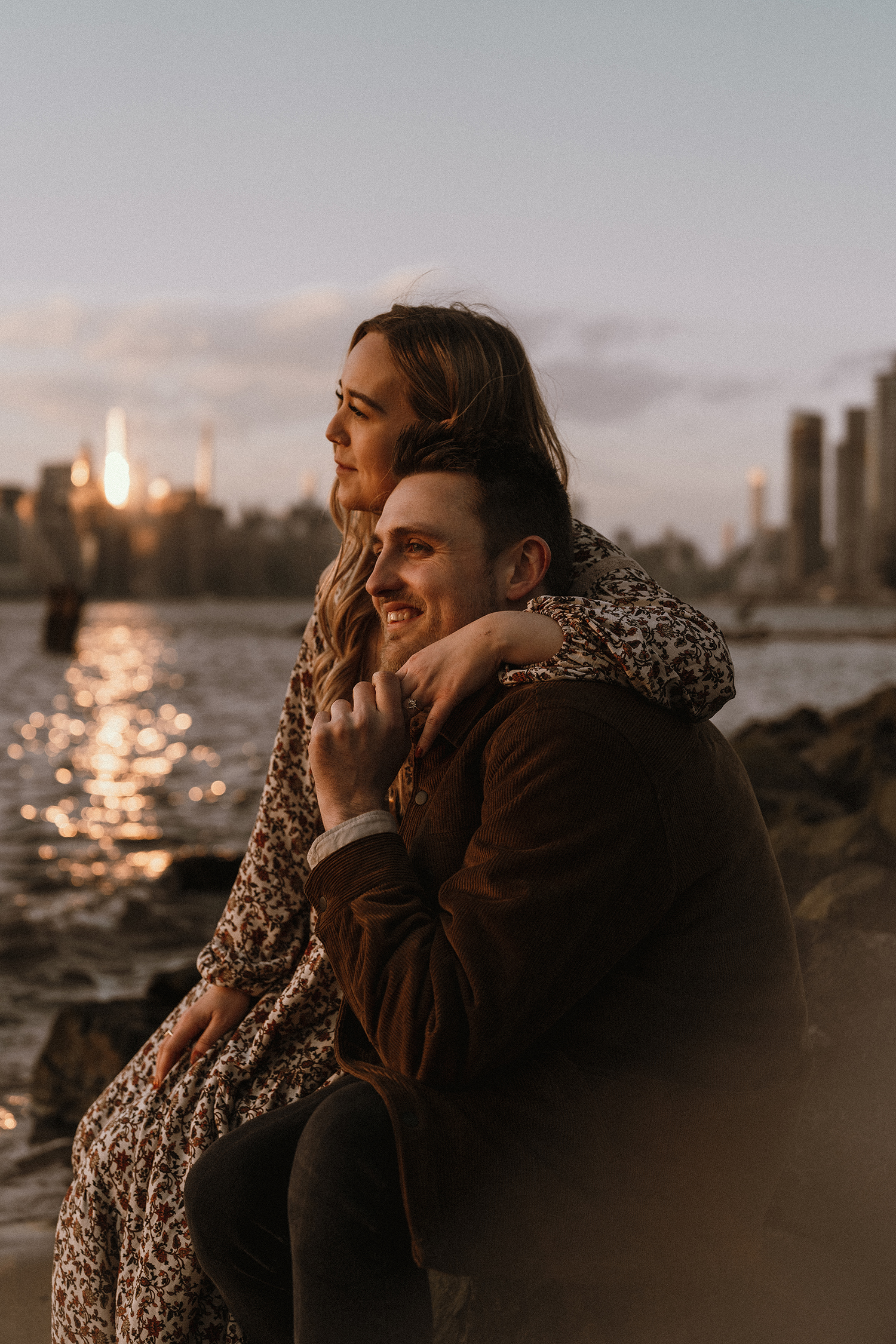 Engagement photos during blue hour looking out over the NYC skyline.