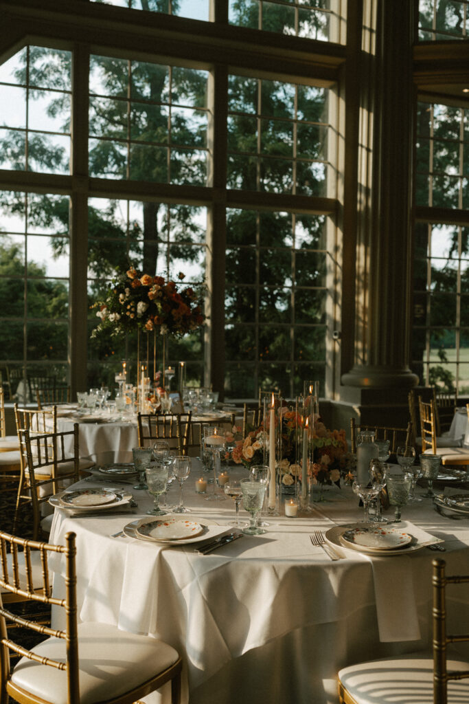 Tables decor with a summery garden feel at a luxury wedding reception at the Ashford Estate.