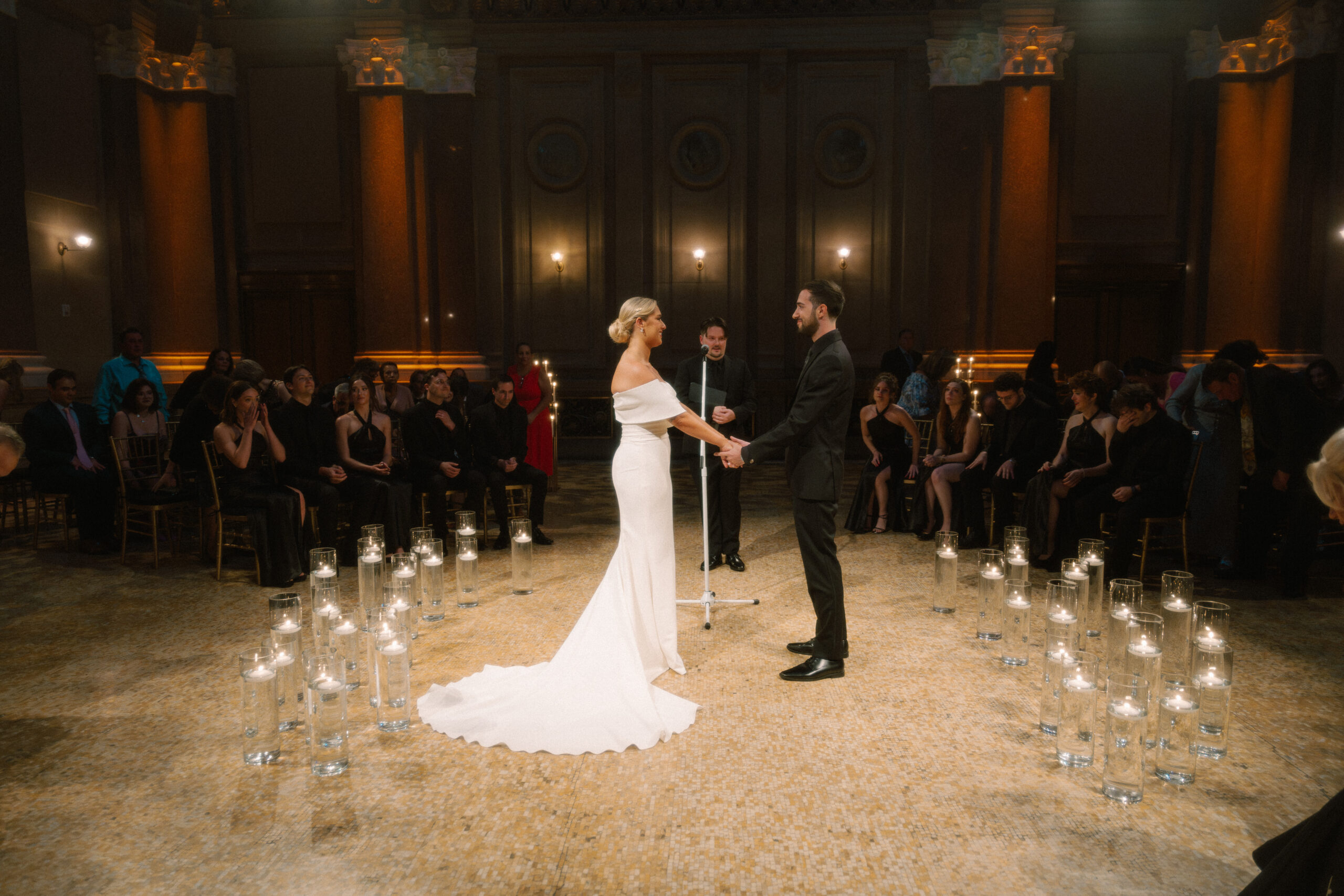 bride and groom in center of Weylin dance floor surrounded in a circle of tapered candles