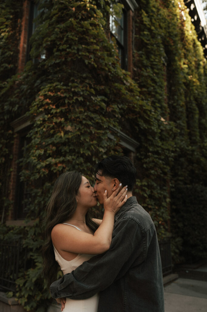 Engagement session West Village NYC in front of ivy covered brownstone Greenwich Village