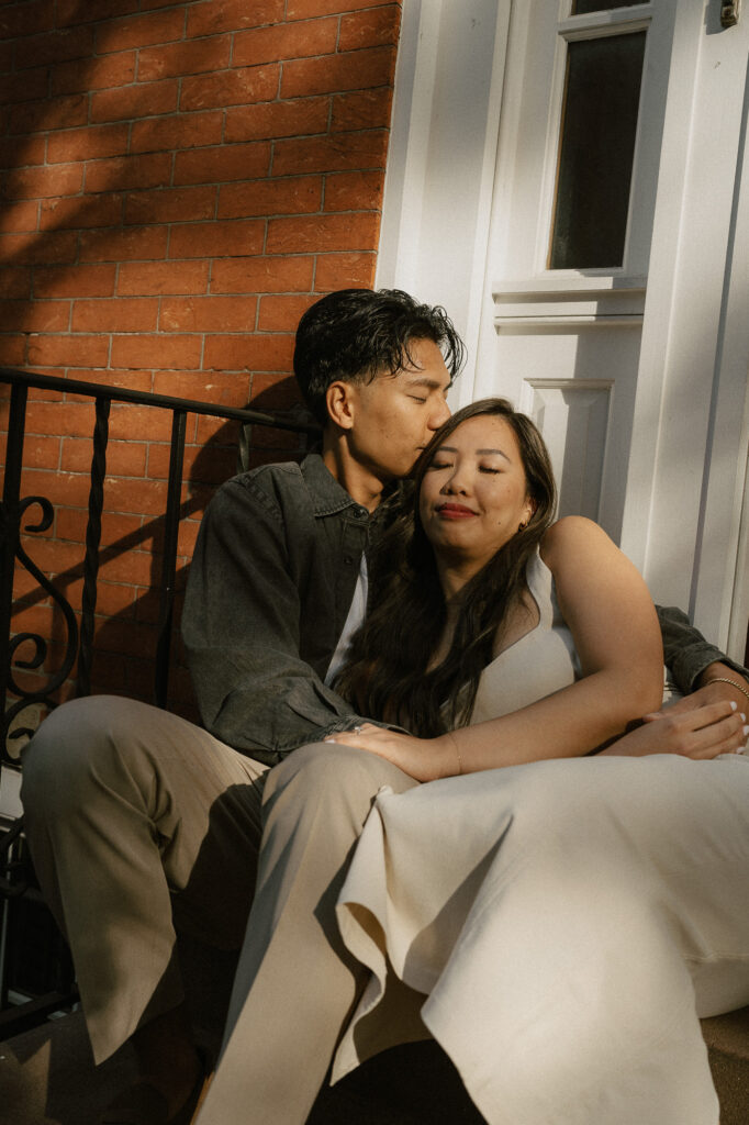 golden hour embrace brings depth and drama to form a romantic photo of engaged couple
