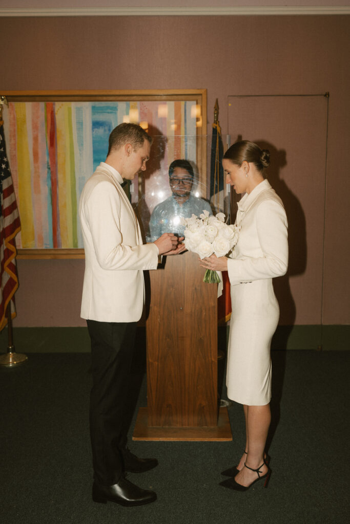 Wedding ring exchange at city hall 141 Worth Street New York, NY