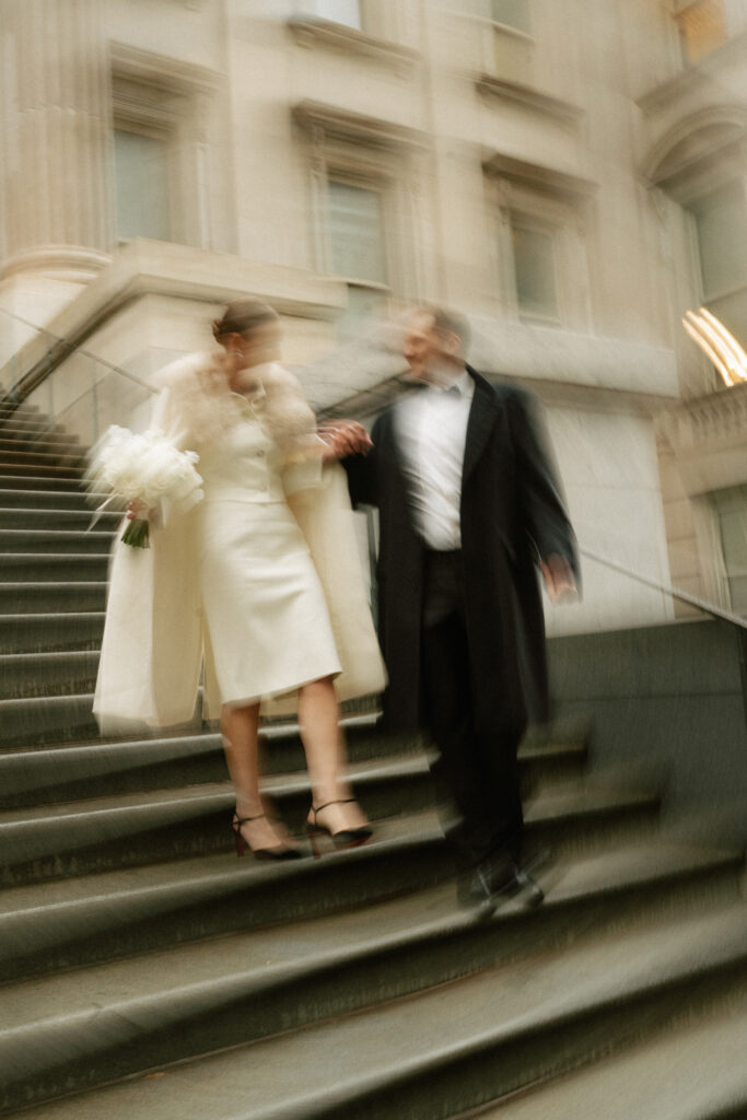 blur photo style showing off winter elopement wedding fashion