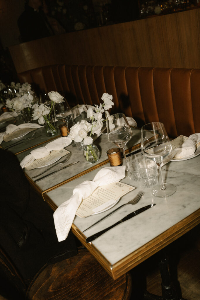 Tablescape at Mino’s Brasserie in the West Village of NY set for hybrid elopement guests 