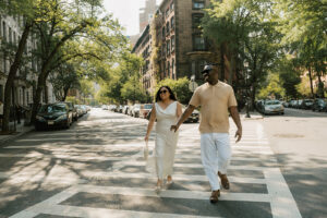 fun stroll through crosswalk orchestrated for NY engagement photo session