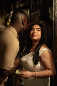 Ear whispers during engagement session