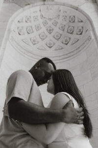 Marble dome envelopes coiple on steps of NY public library
