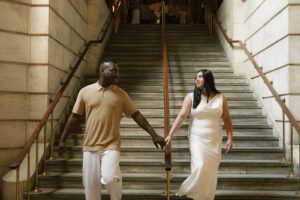Descending marble steps at NY Public Library for Engagement Session