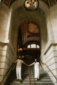Interracial couple engagement photos inside the New York Public Library