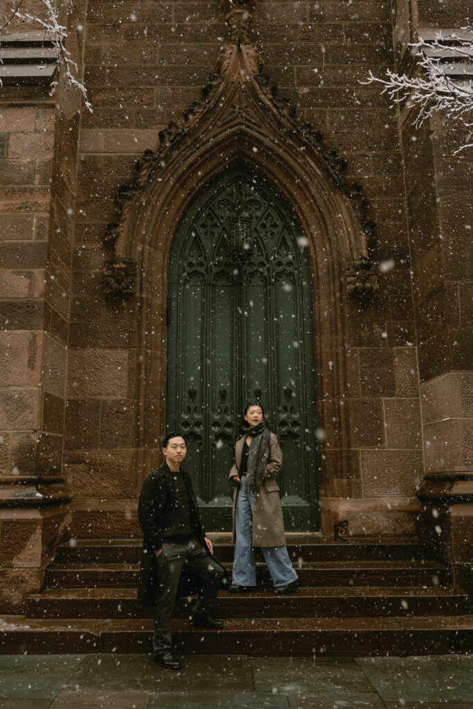 Snowy engagement photos in New York City with a cinematic style.