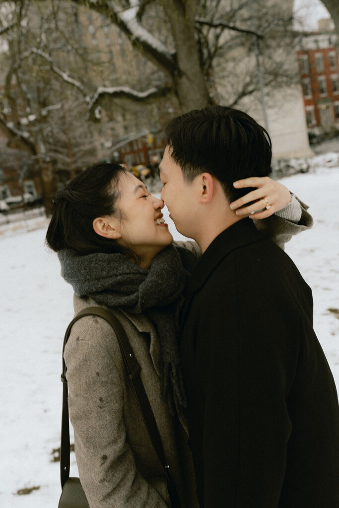 Couples photos in Washington Square Park after a snowfall.