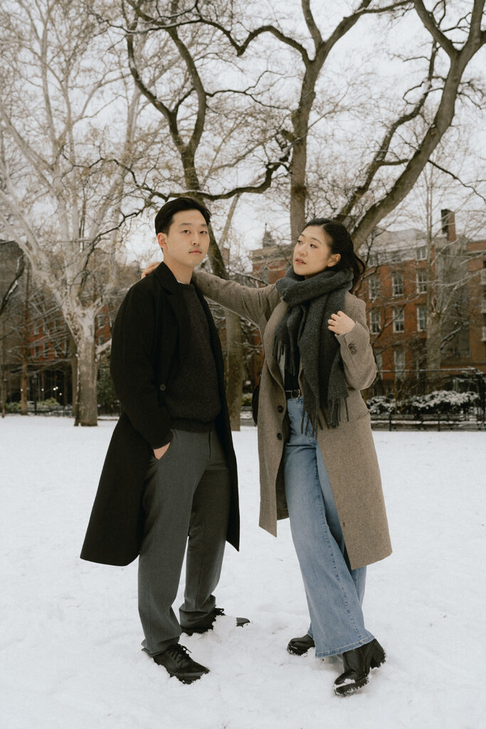 Couples photos in Washington Square Park after a snowfall.